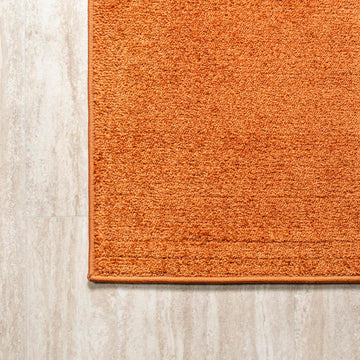 Haze Solid Low-pile Area Rug Orange